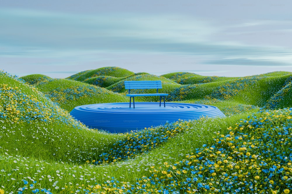 a blue bench sitting on top of a lush green field