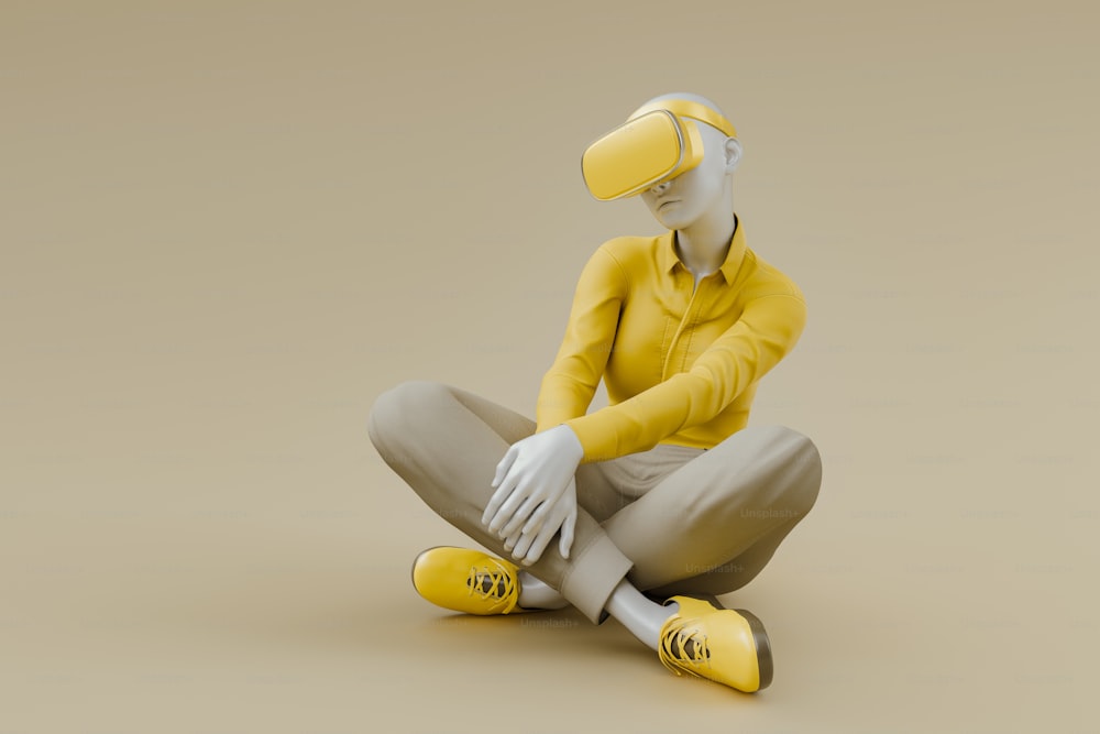 a person sitting on the ground wearing a yellow hat