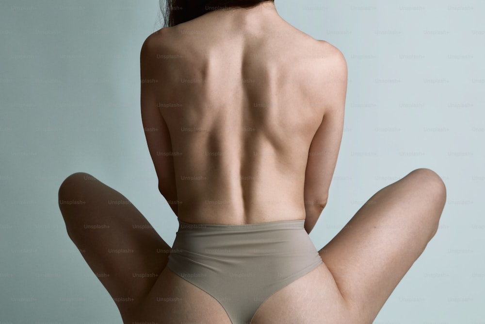 a woman with her back turned to the camera