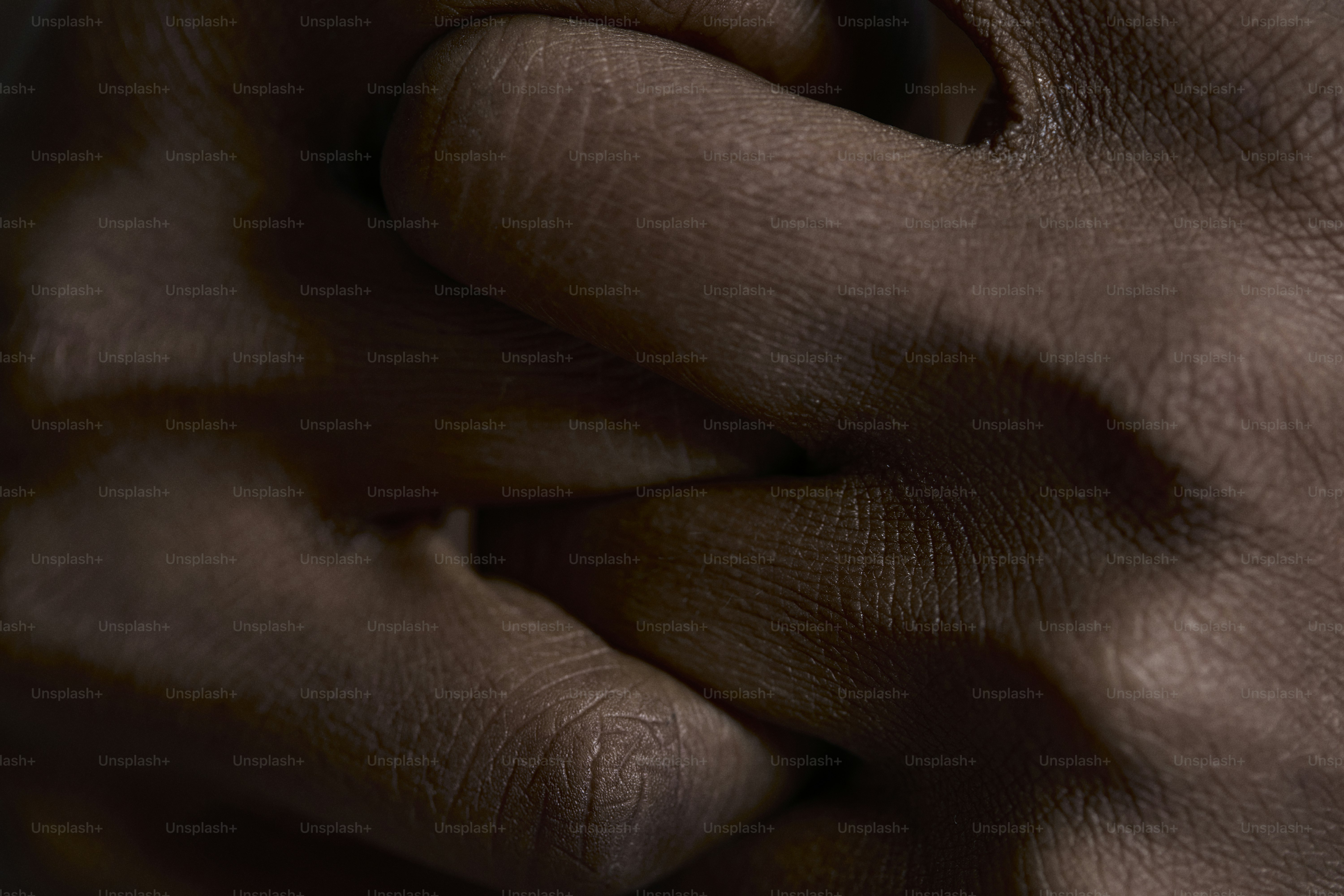 a close up of a person's hand holding something