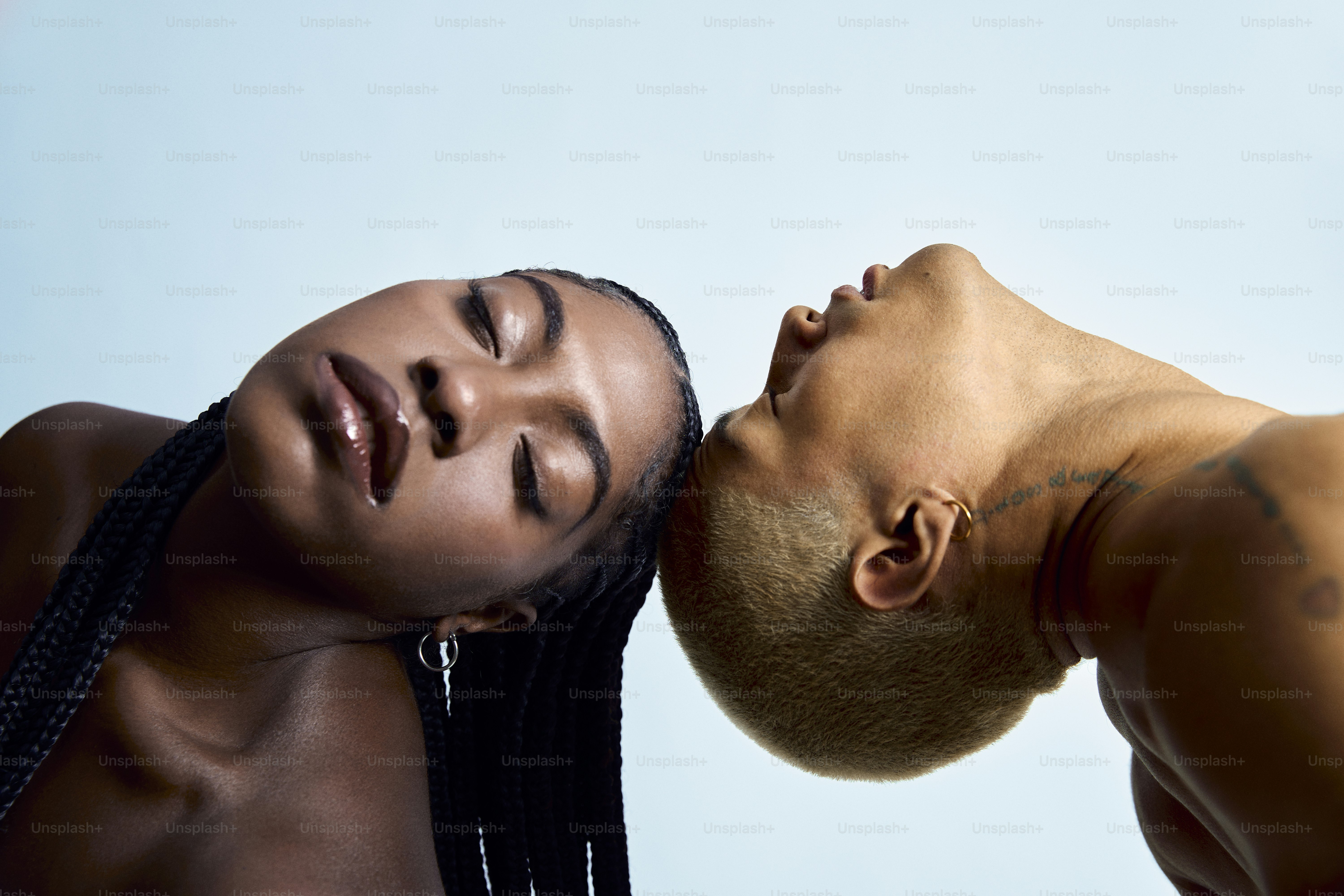 a man and a woman are kissing each other