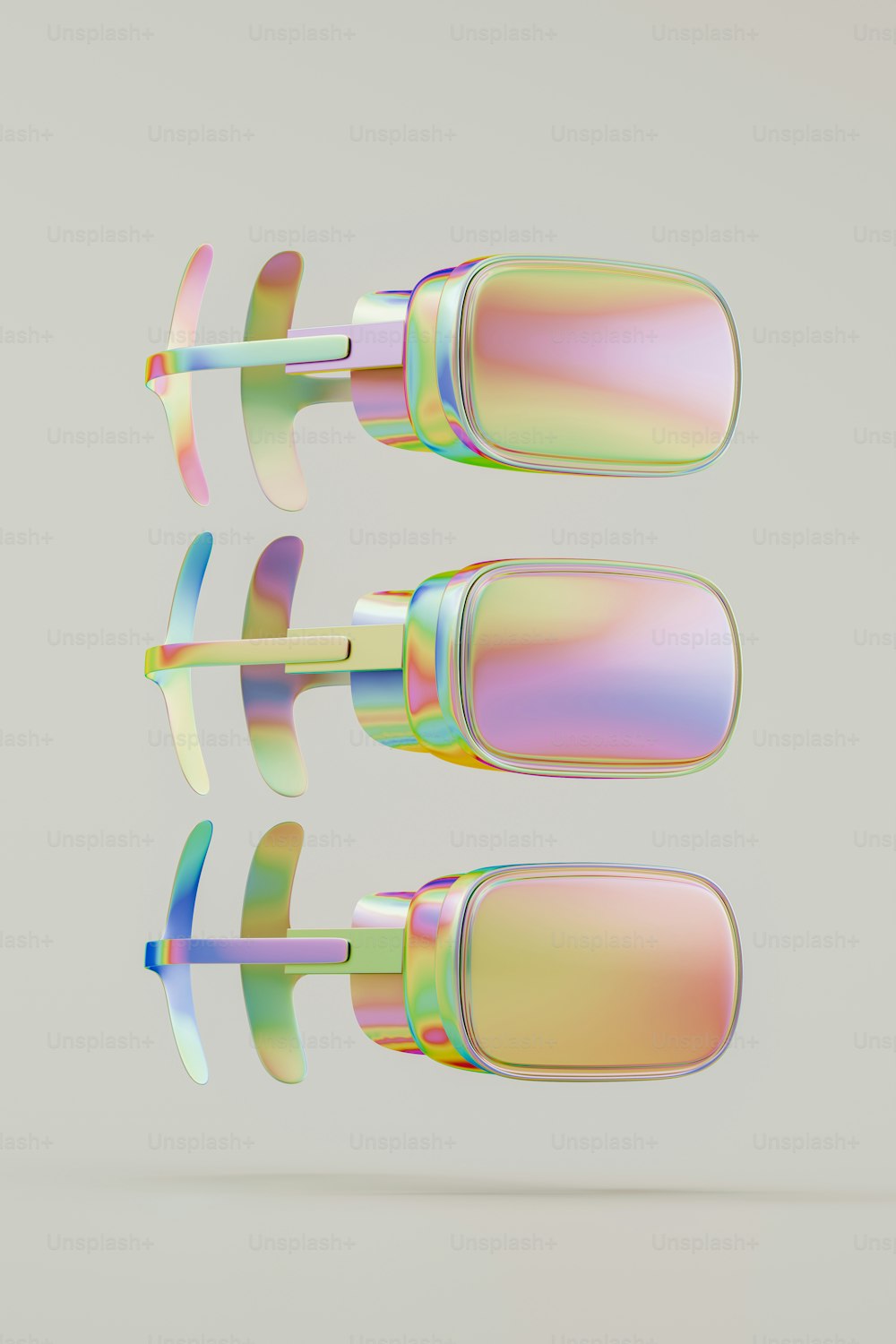 a pair of sunglasses with iridescent lenses are flying through the air