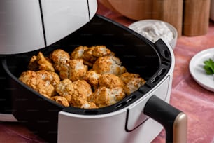 a close up of a food processor on a table