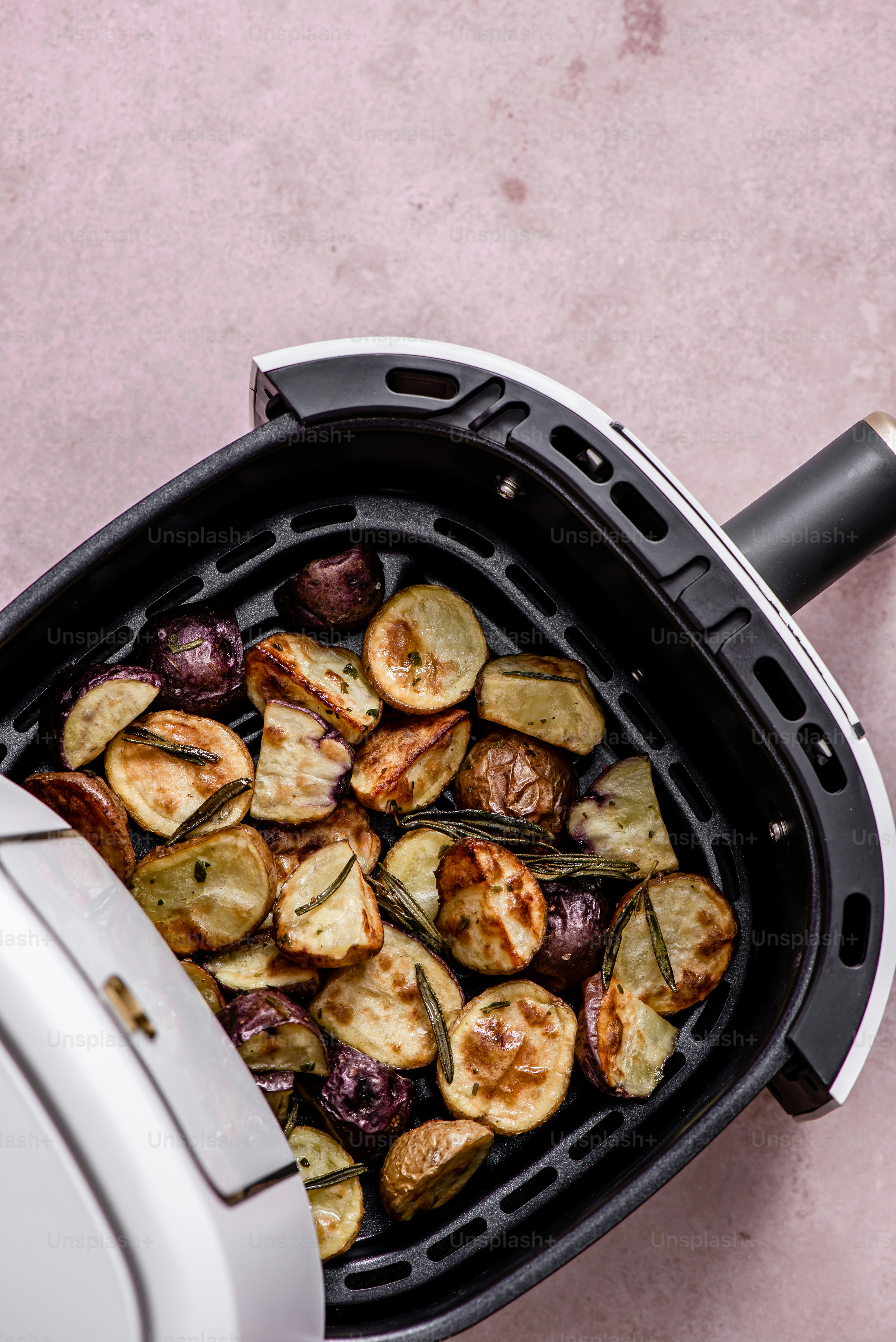a close up of a grill with food inside of it