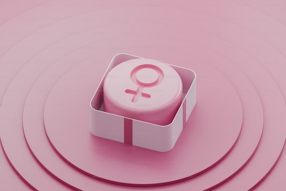 a pink box with a female symbol on it