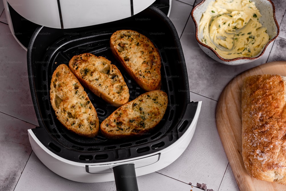 a close up of bread in an air fryer