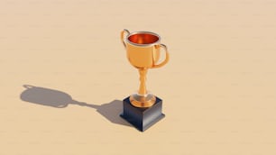 a golden trophy sitting on top of a black pedestal