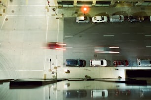 a parking garage filled with lots of parked cars