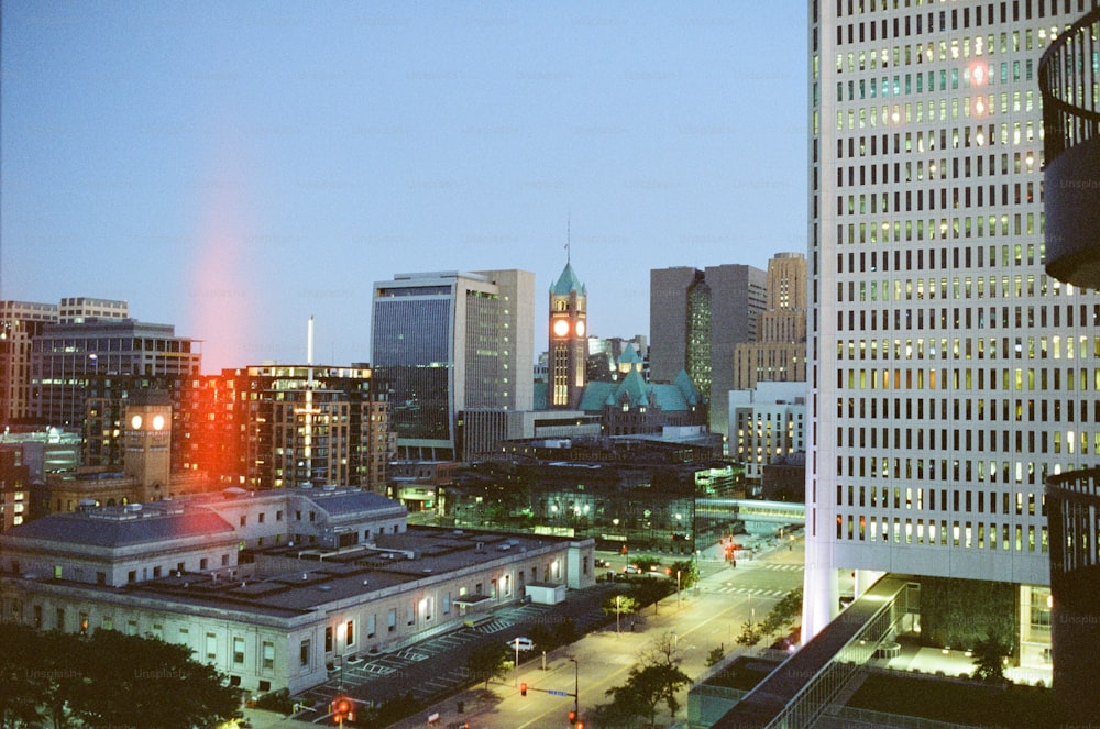 a view of a city at night from a high rise building