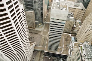 an aerial view of a city with tall buildings