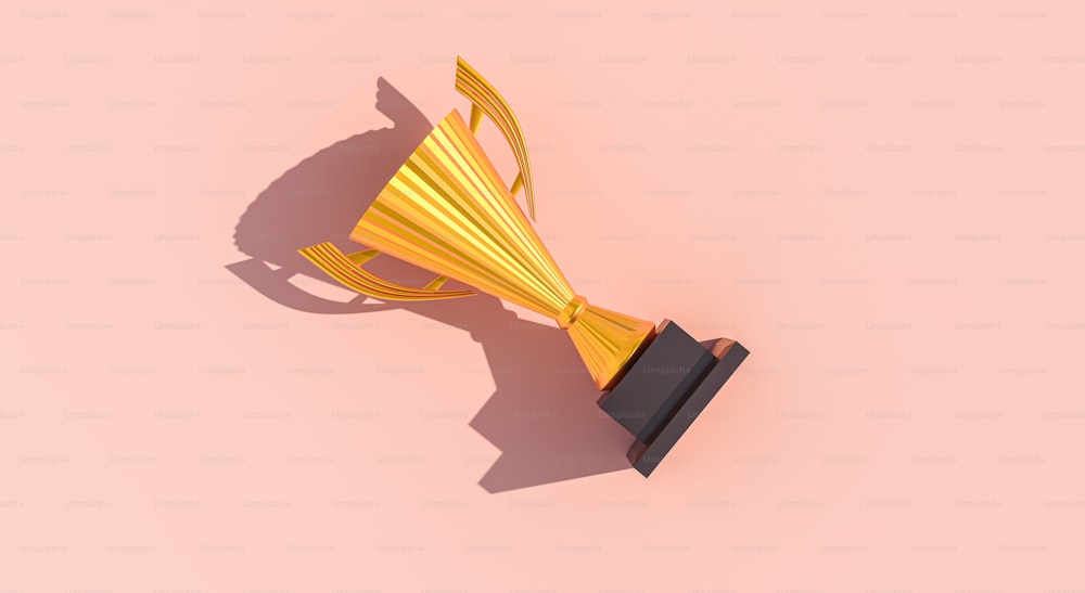 a gold trophy on a pink background