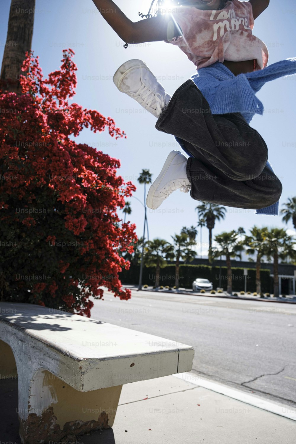 a person jumping in the air on a skateboard