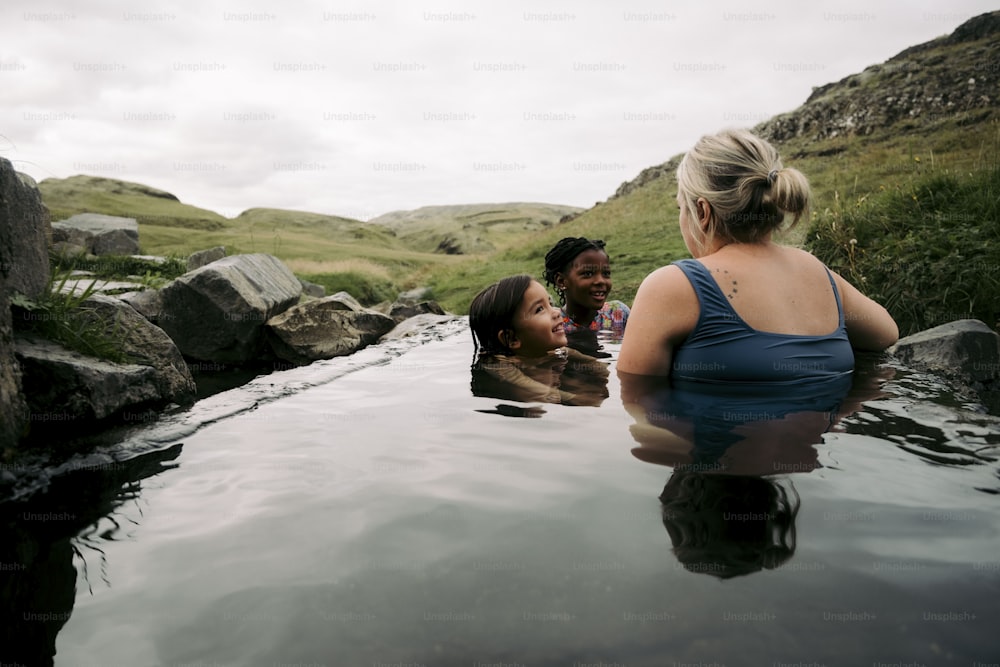 a group of people in a body of water