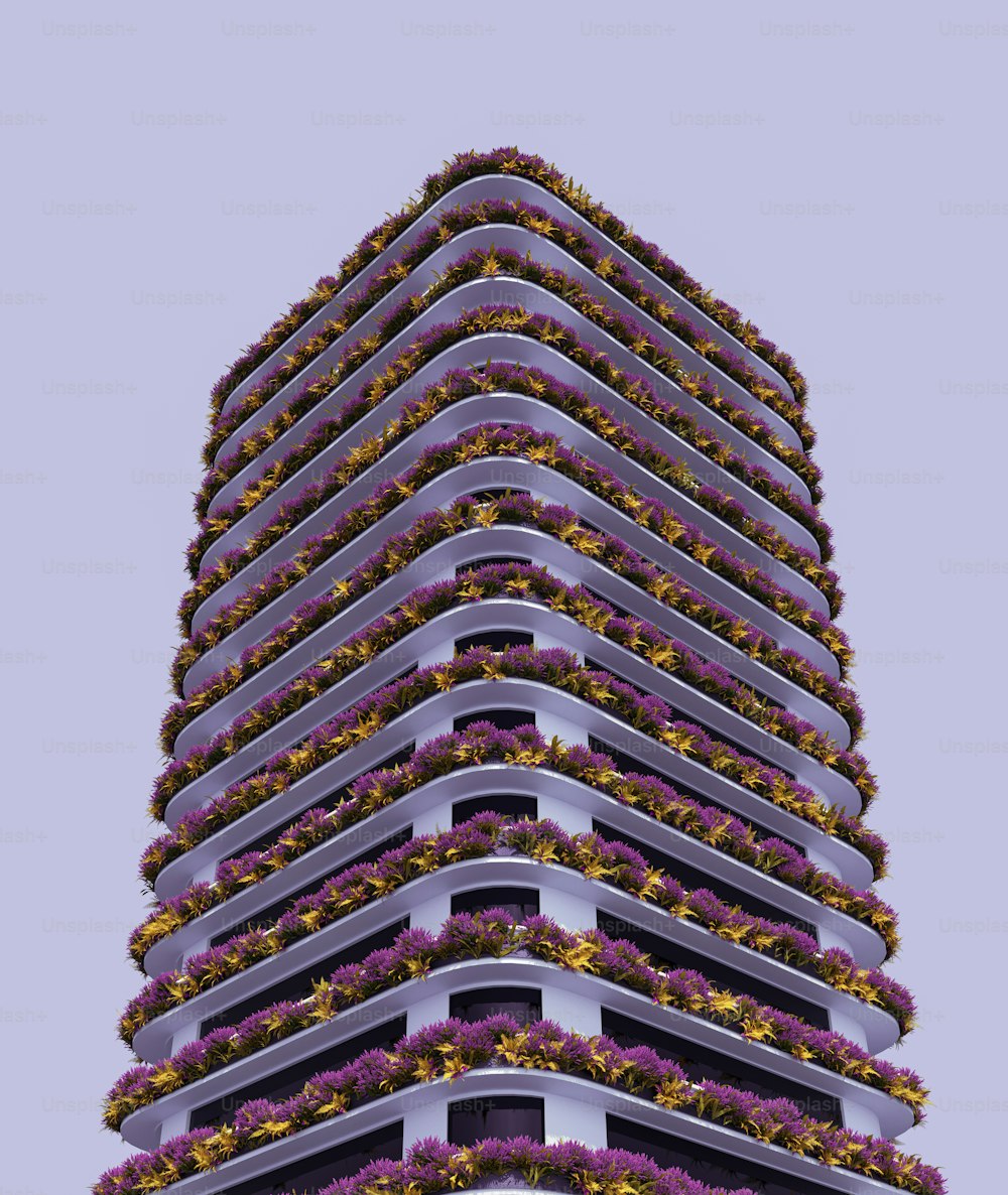 a very tall building with a bunch of flowers on it