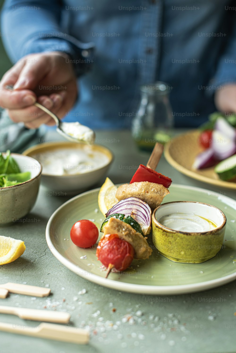 a person is eating a meal on a plate