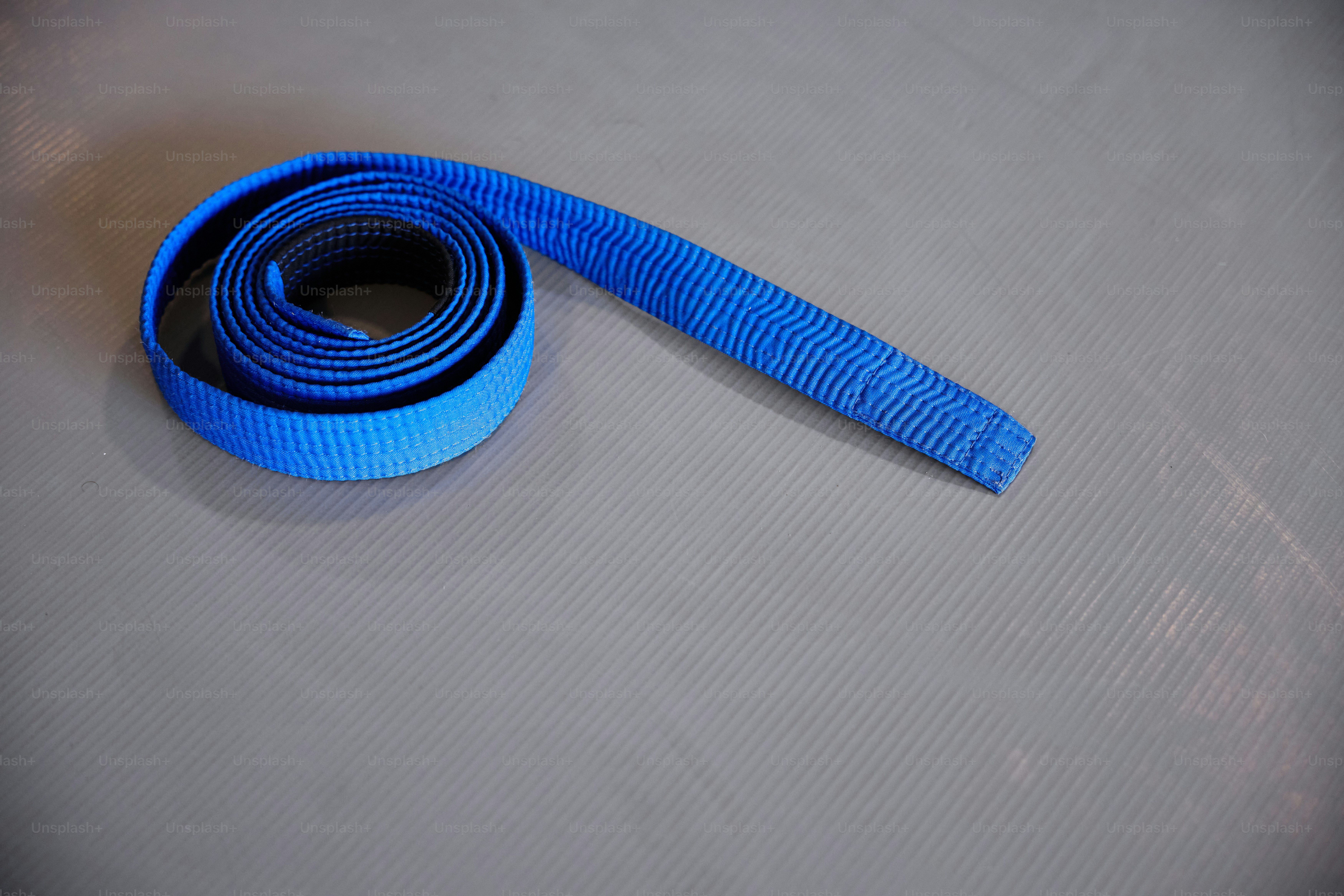 a blue strap laying on top of a table