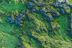 an aerial view of a green mountain range