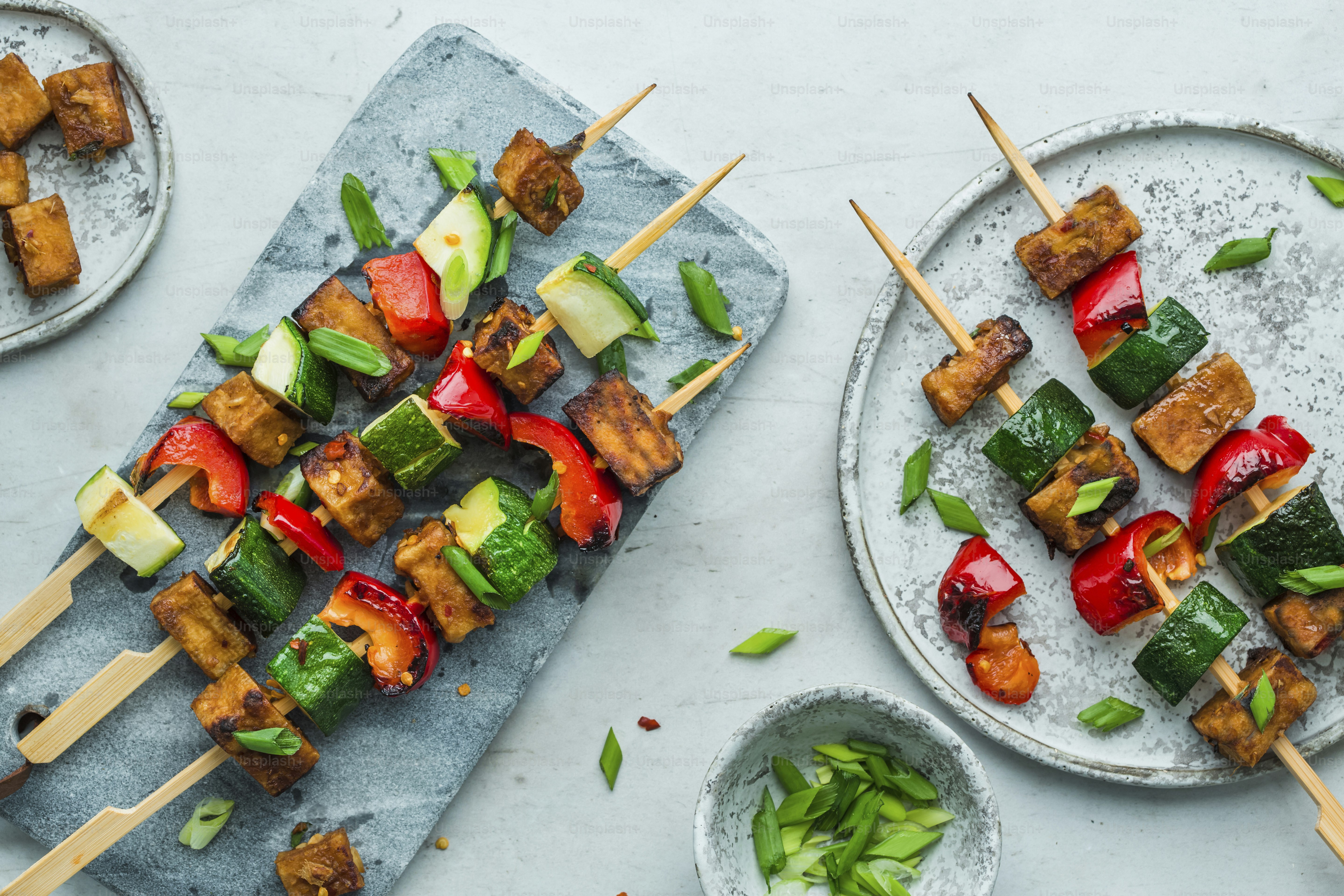a table topped with two plates of food