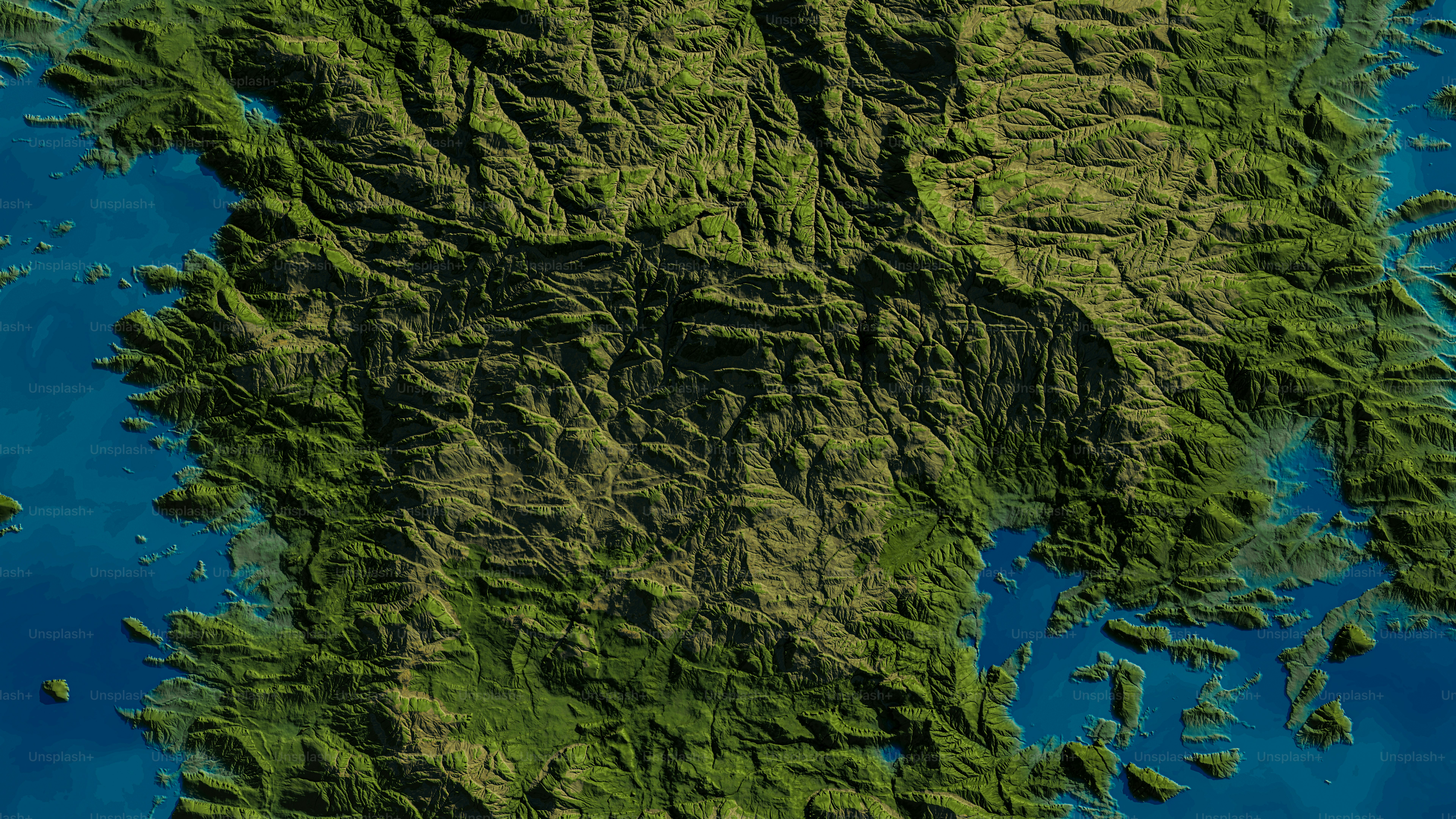 A satellite image of a mountain range in the middle of the ocean photo ...