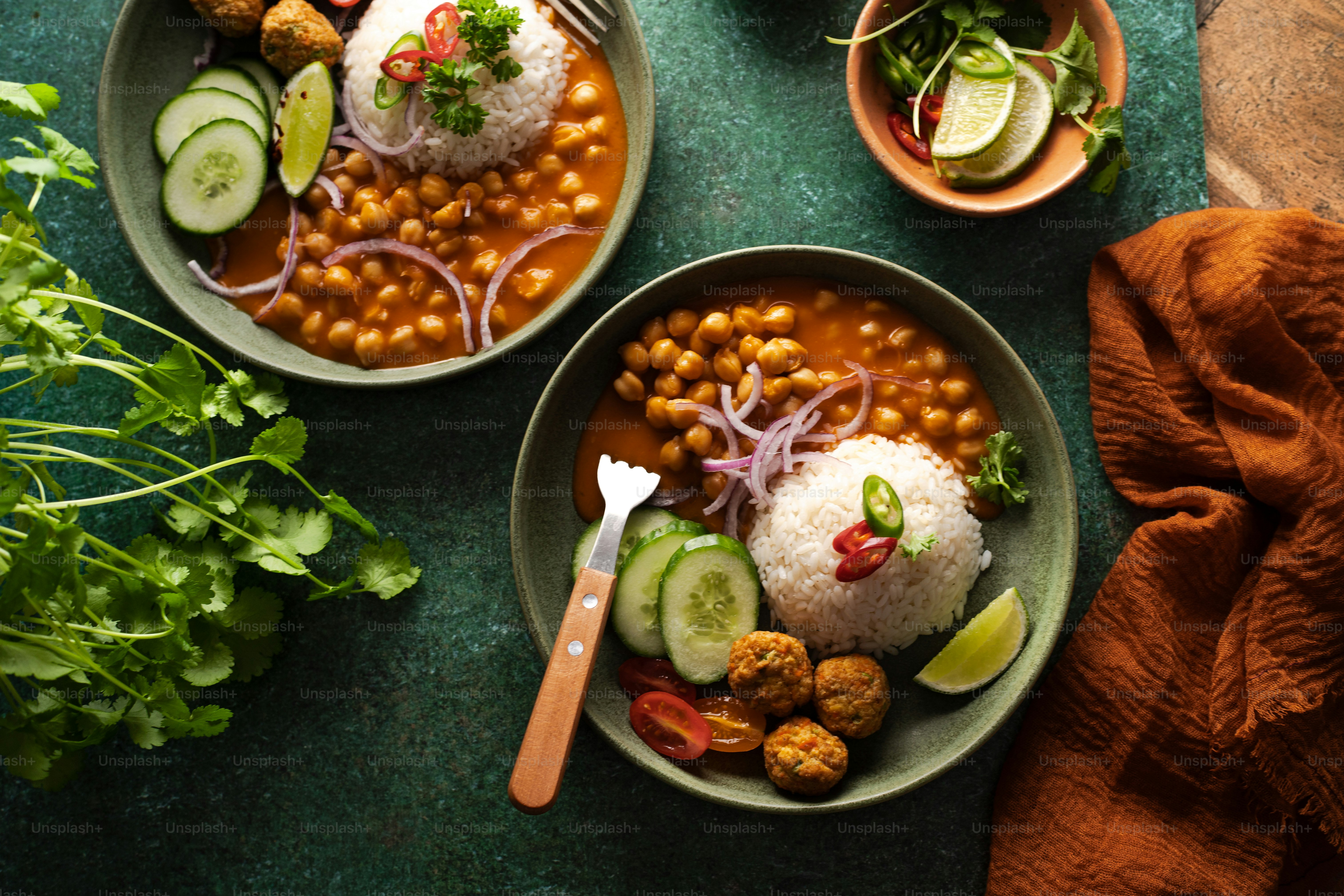 a couple of bowls of food on a table