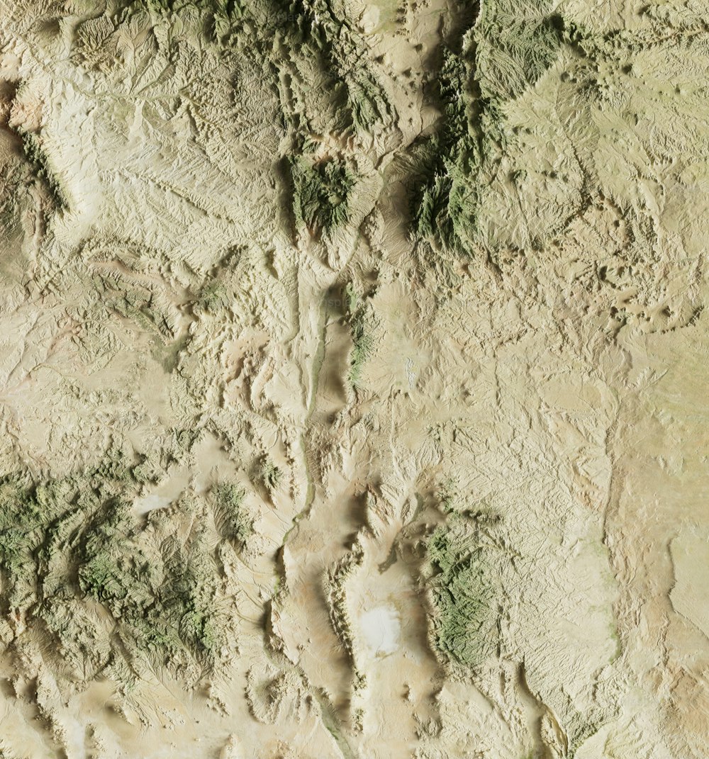 an aerial view of the terrain of a mountain range