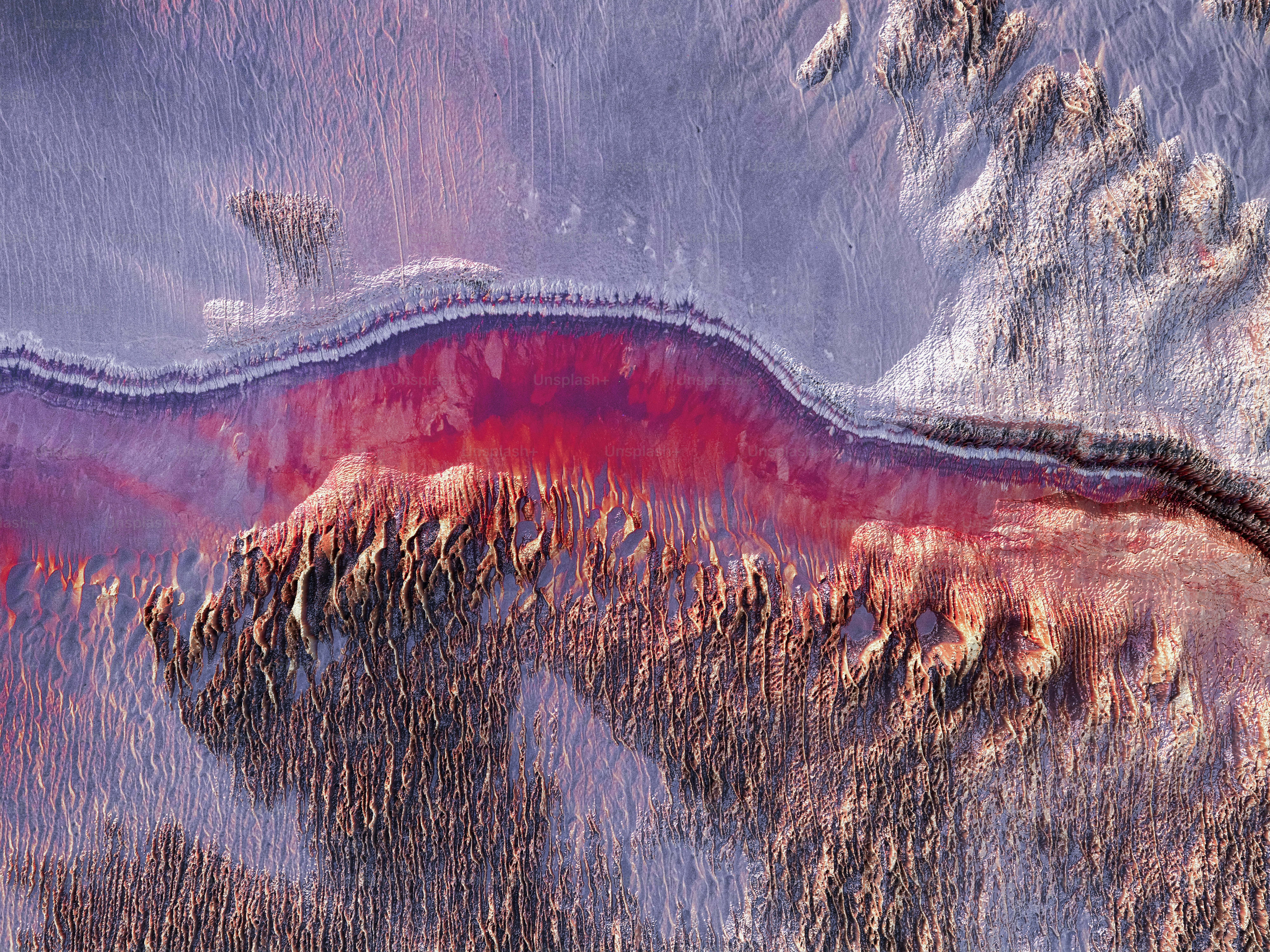 a group of people standing in the middle of a body of water