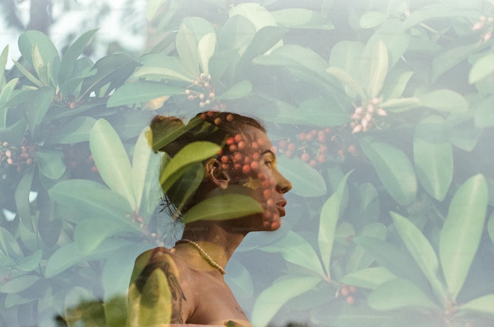 a woman with a bush in her hair