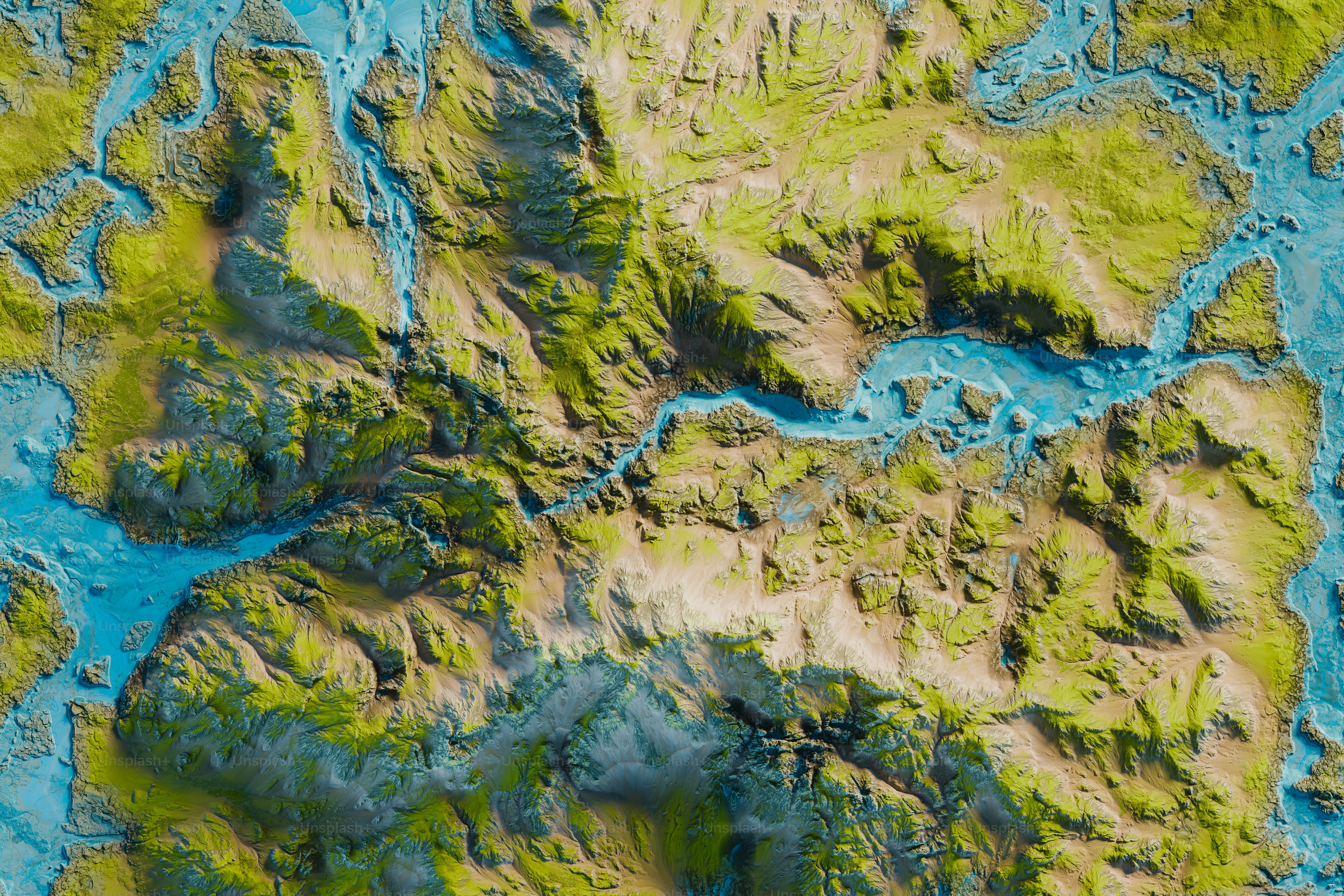 an aerial view of a river and land