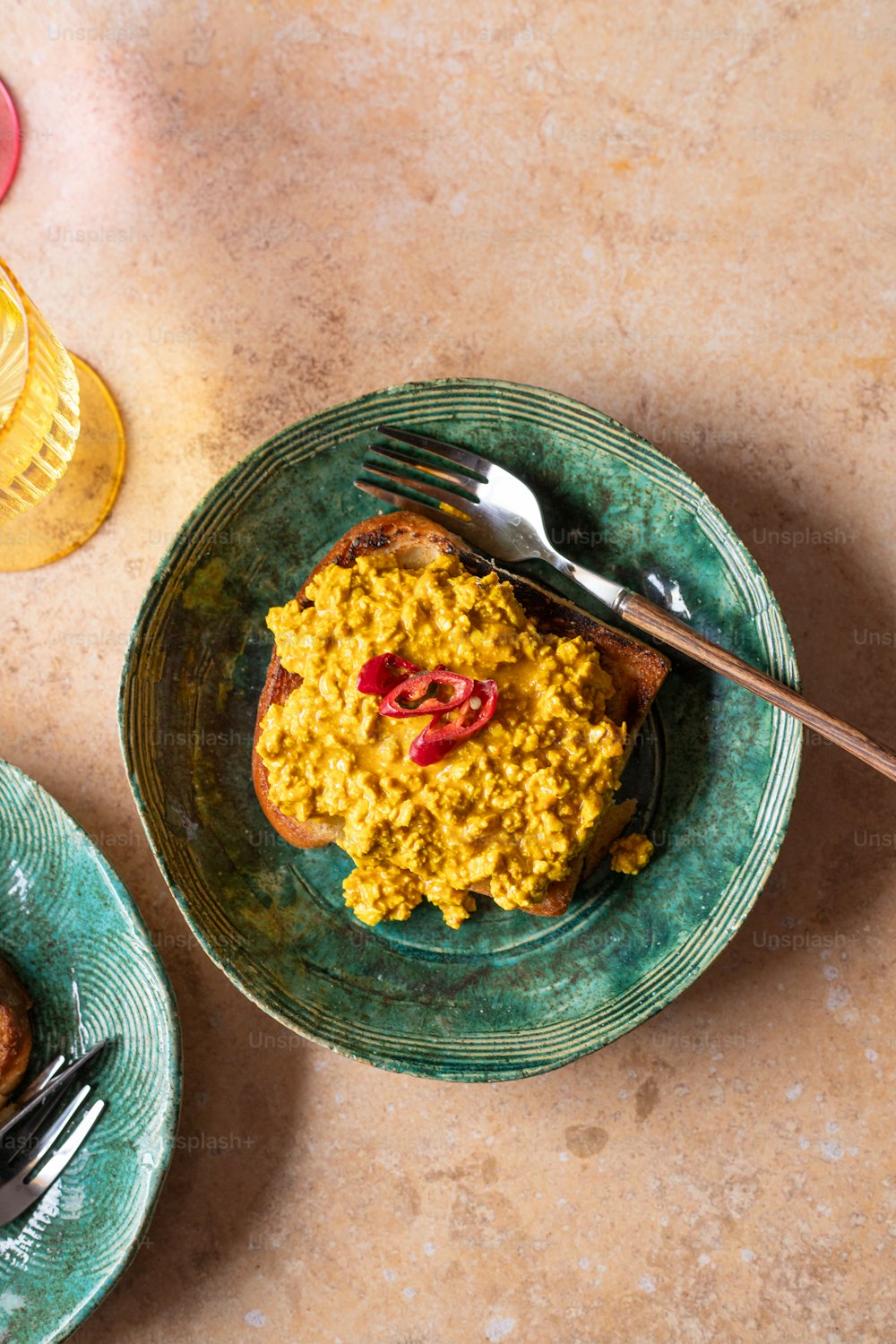 a plate of food on a table with a fork