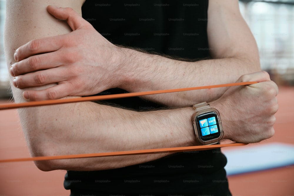 a man with a smart watch on his arm