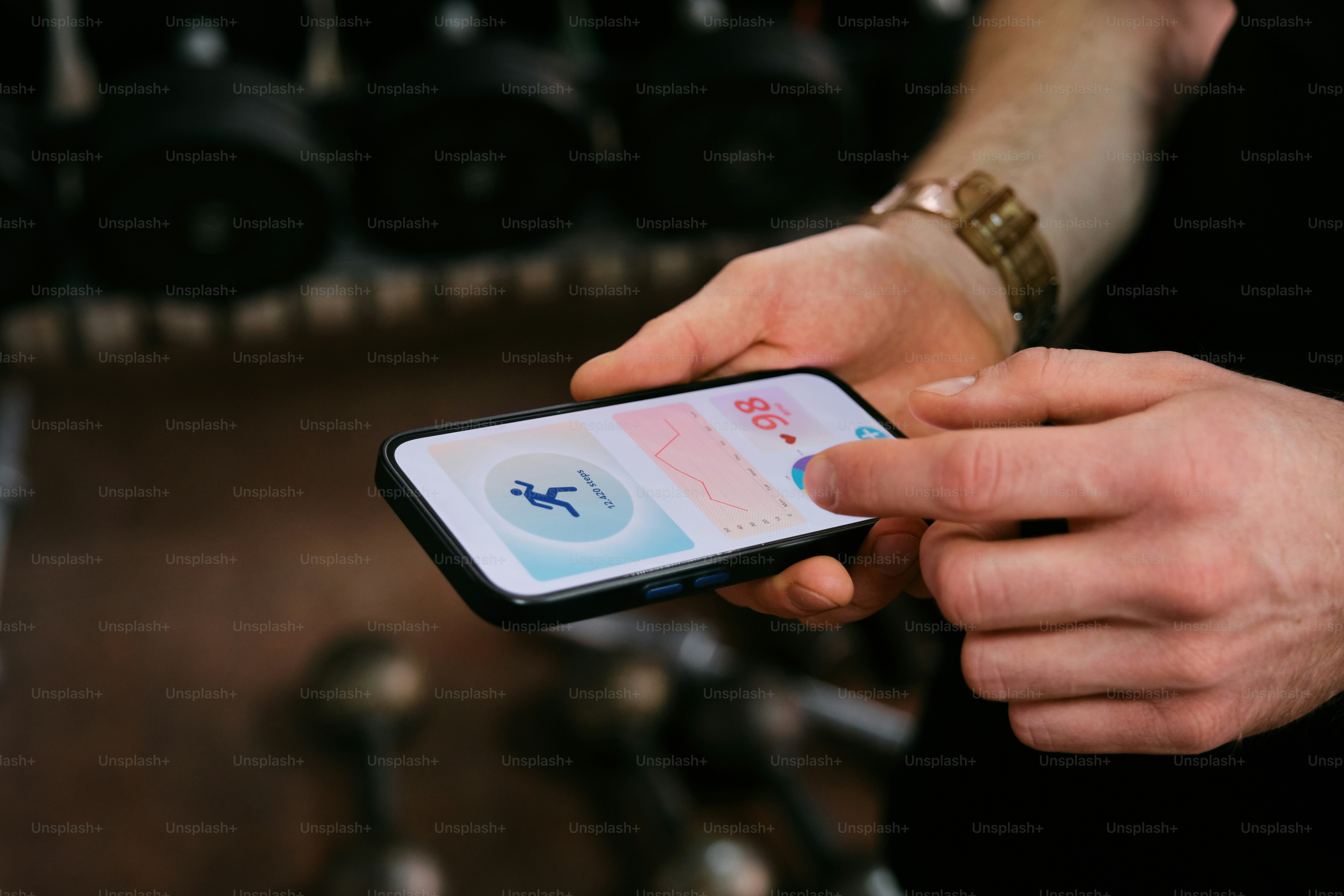 a person holding a smart phone in their hand