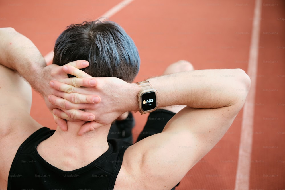 a man with his hands on his head