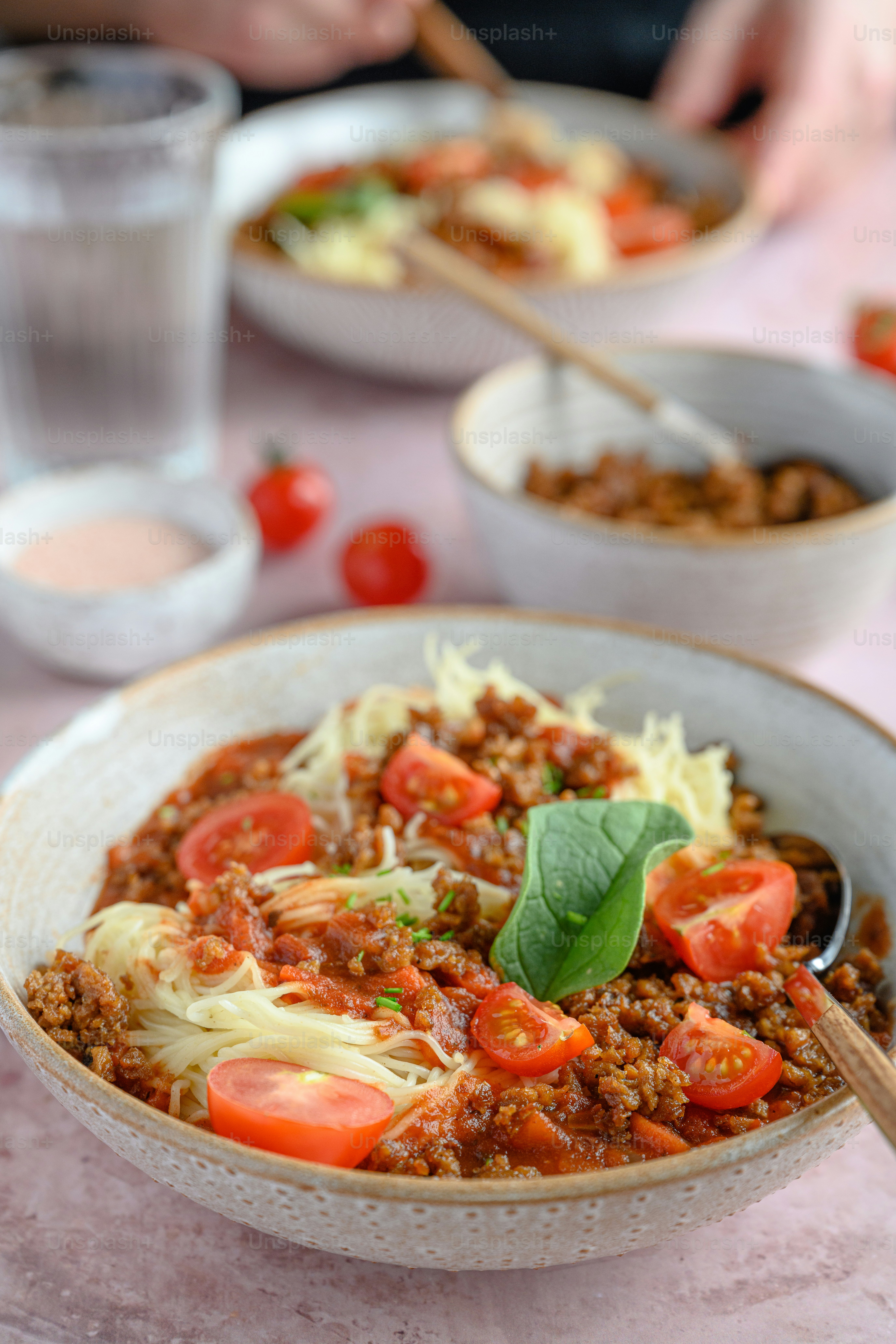 a bowl of food with a spoon in it