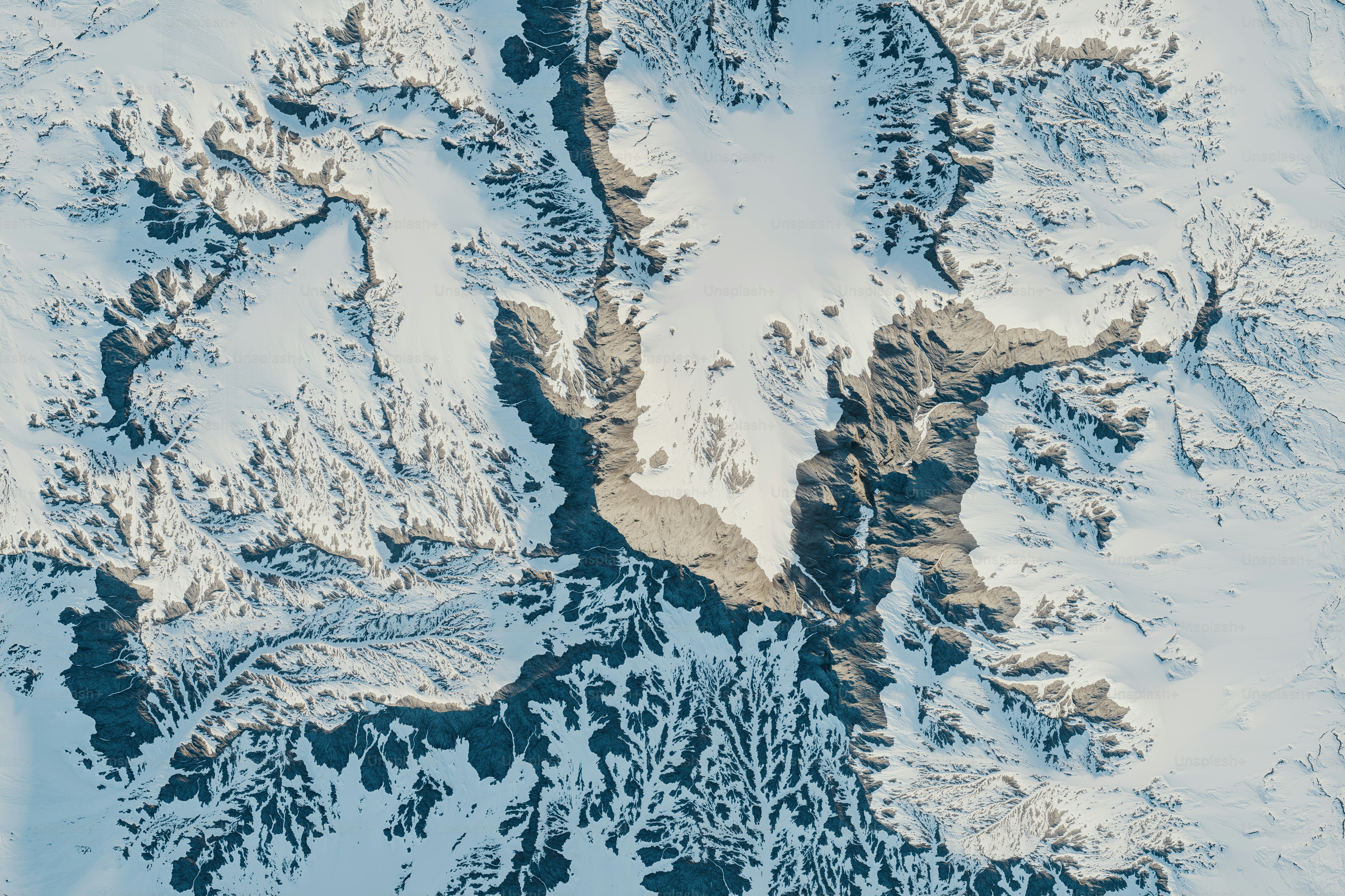 3D render of a snowy terrain from an aerial view.