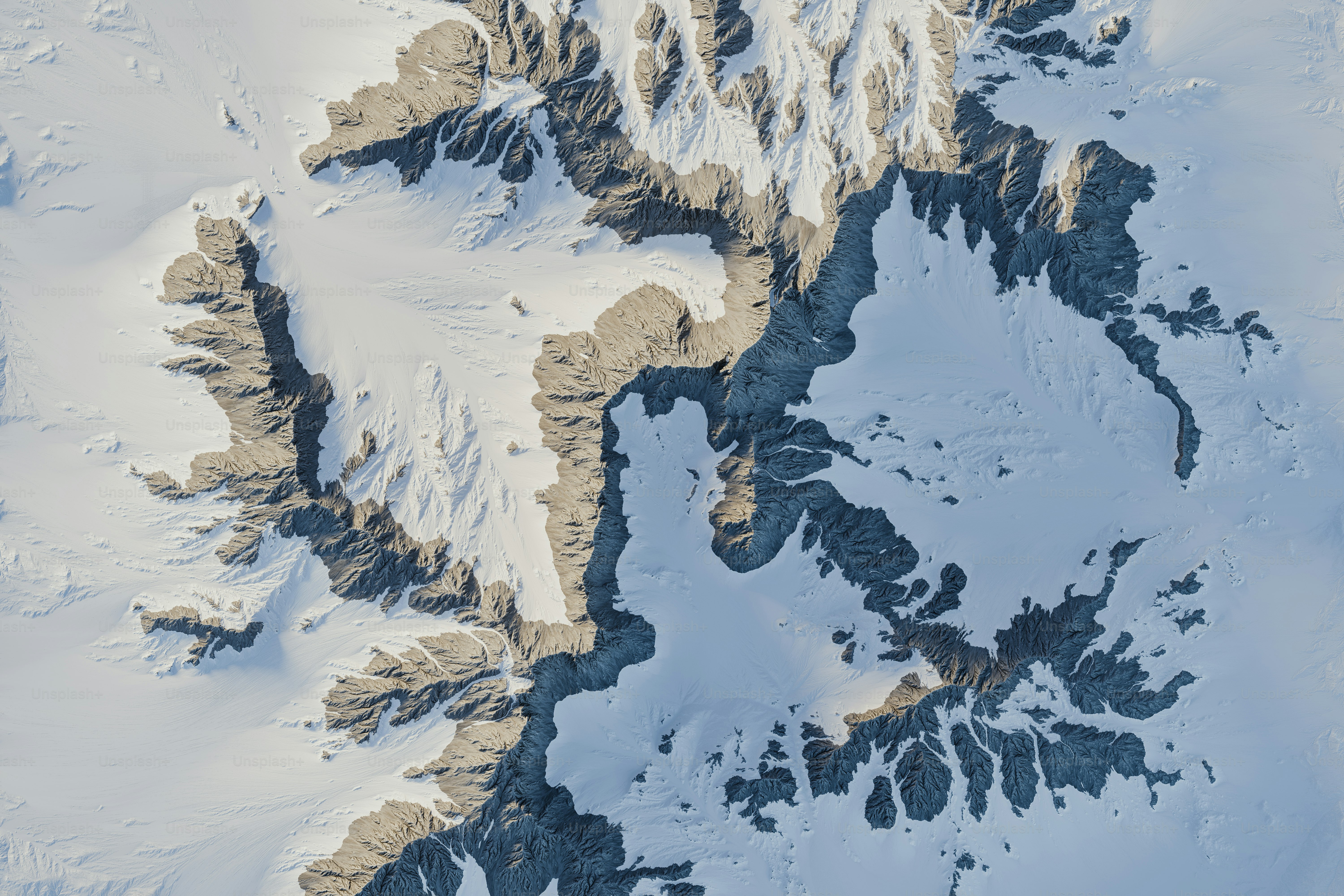 An aerial view of a snow covered mountain range photo – 3d Image on ...