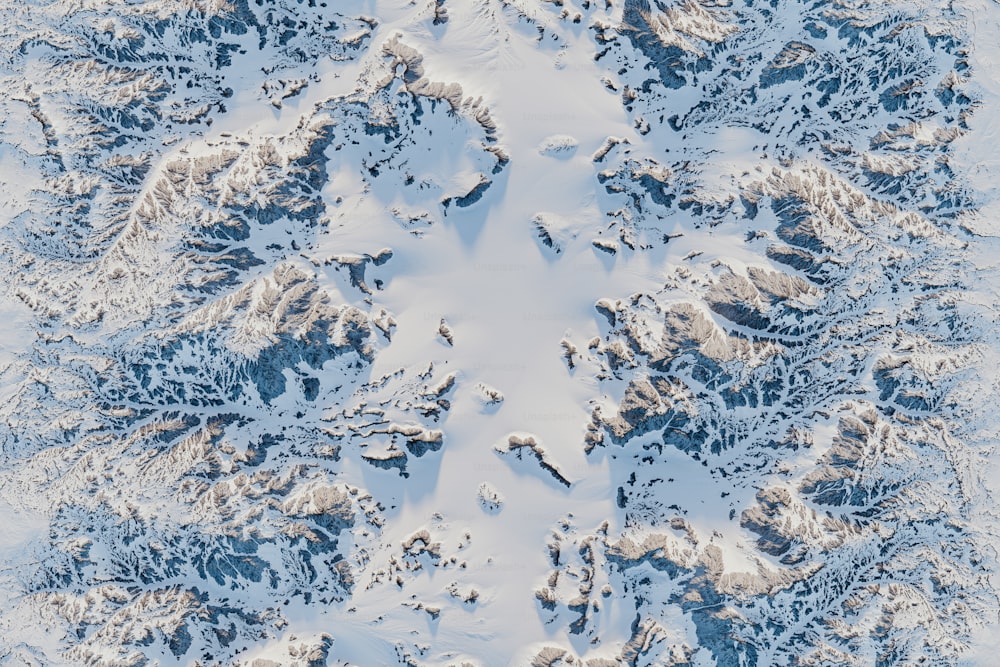 an aerial view of a snow covered mountain