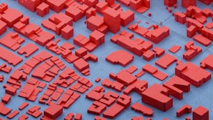 a large group of red buildings on a blue surface