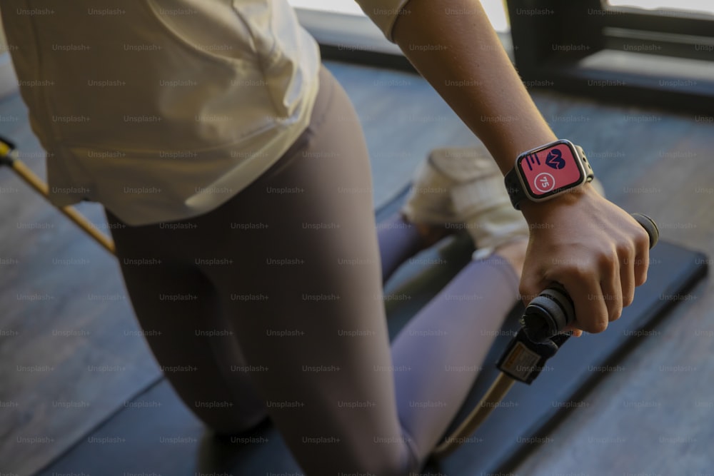 a close up of a person with a watch on their wrist