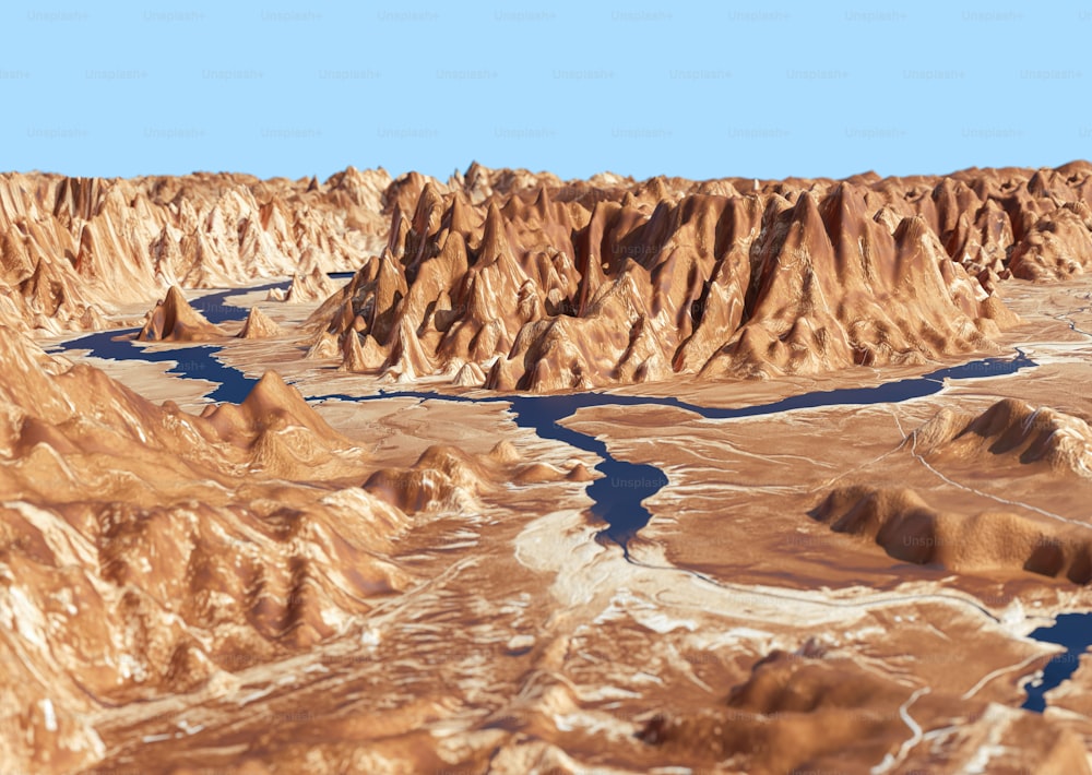 an aerial view of a desert with a river running through it