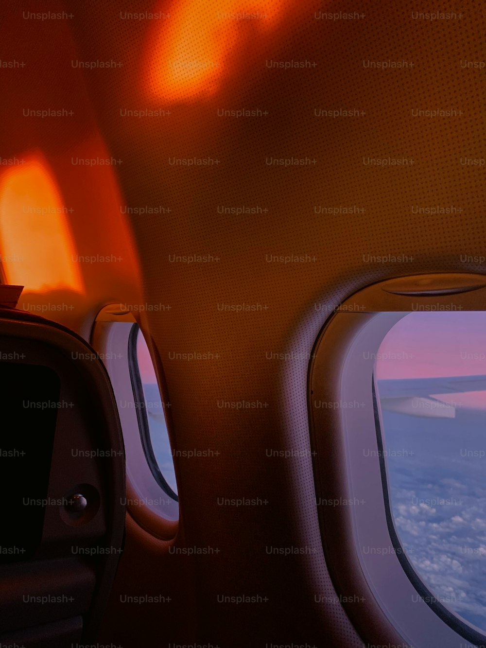 a view of the wing of an airplane from inside the plane