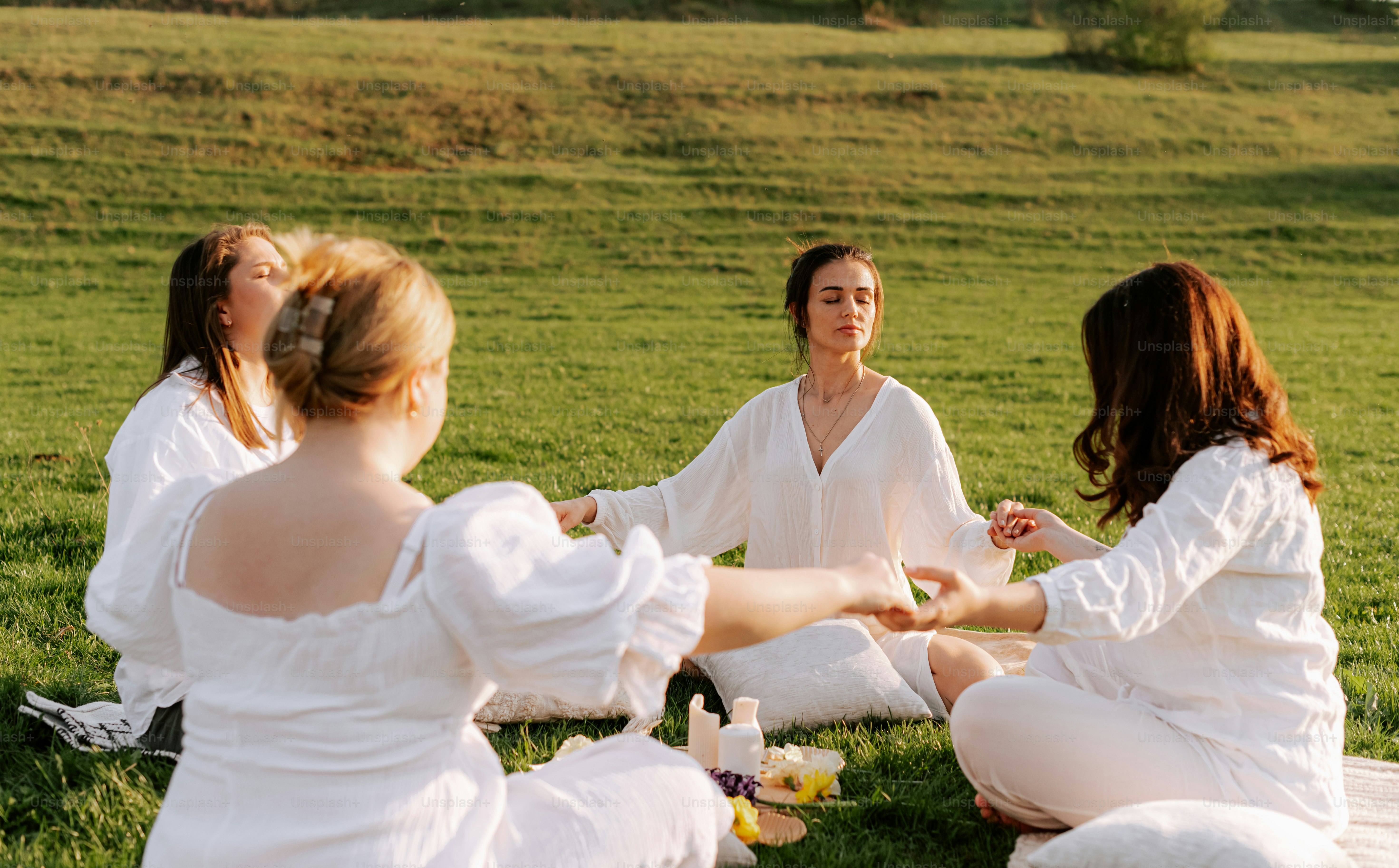 An aesthetic image of women peacefully closing their eyes, representing the
use of DBT skills and the Body Scan for emotion regulation.
