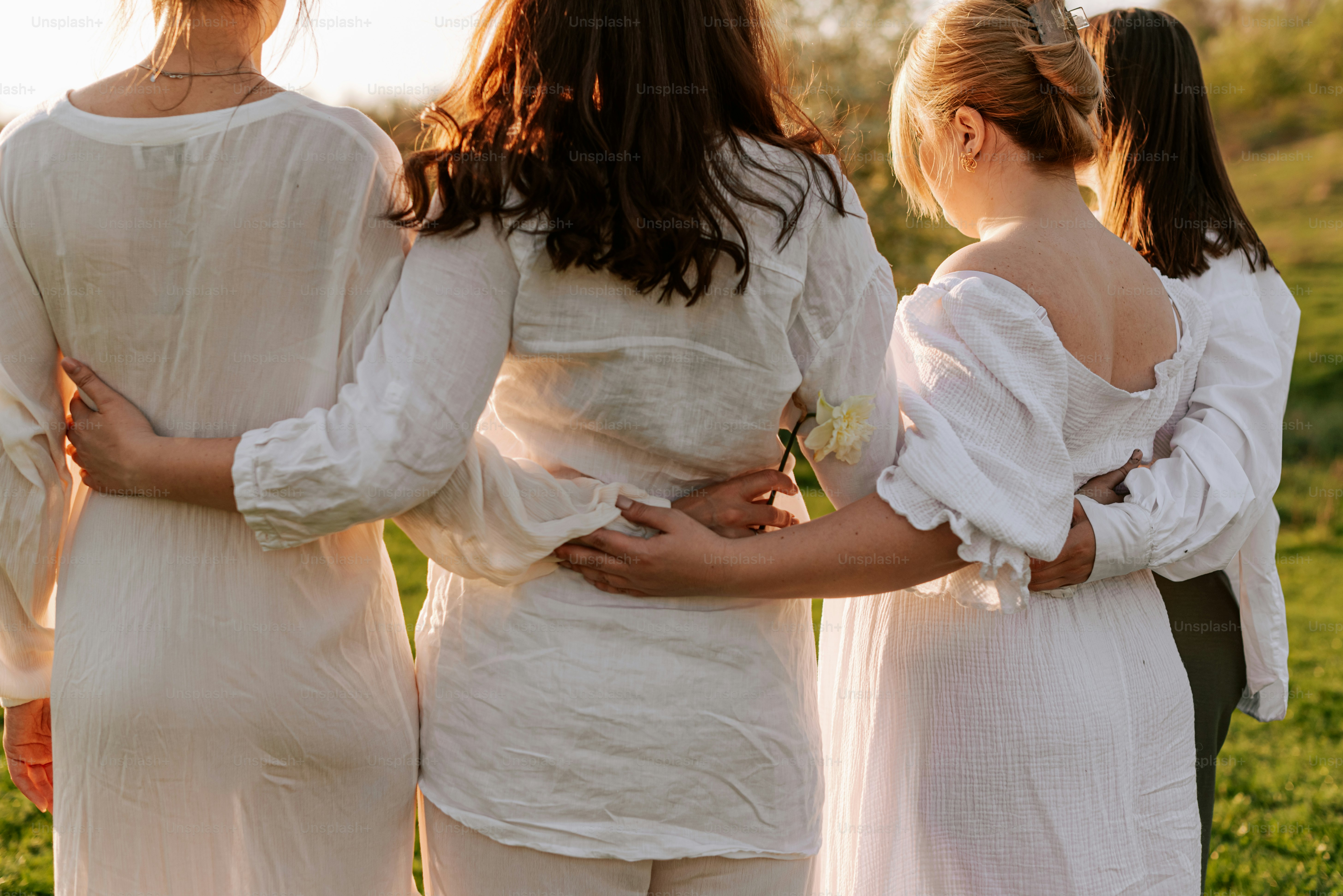 a group of women standing next to each other