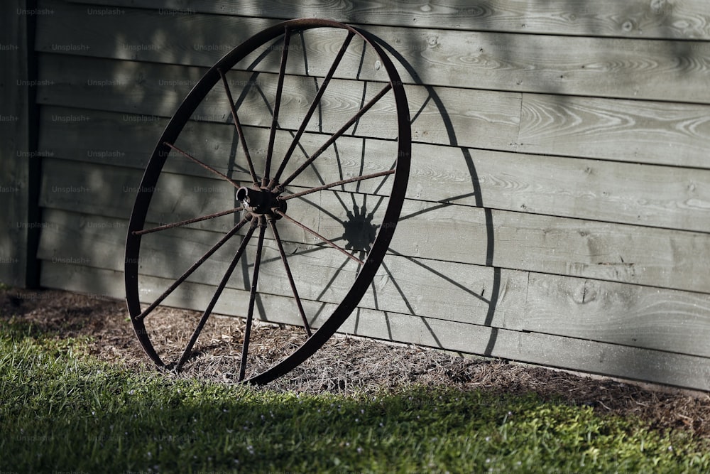 a wheel on the side of a building