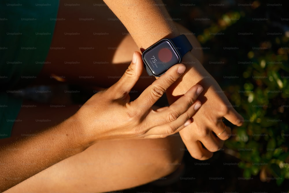 a close up of a person holding a cell phone