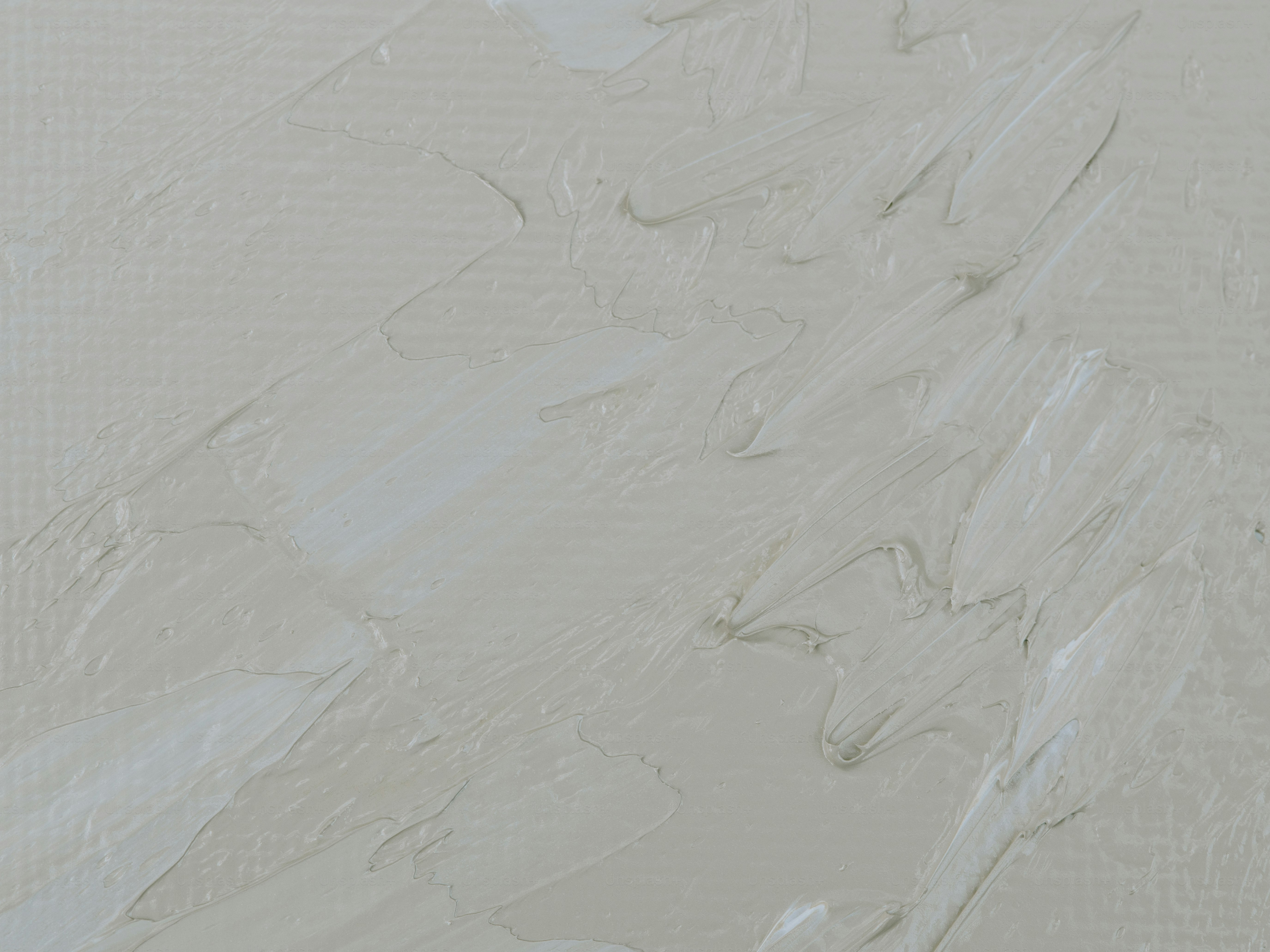 a painting of white paint on a wall