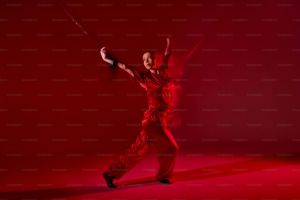 a man in a red outfit holding a baseball bat
