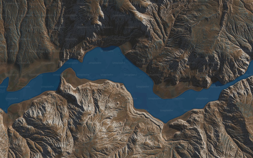 a satellite image of a lake surrounded by mountains