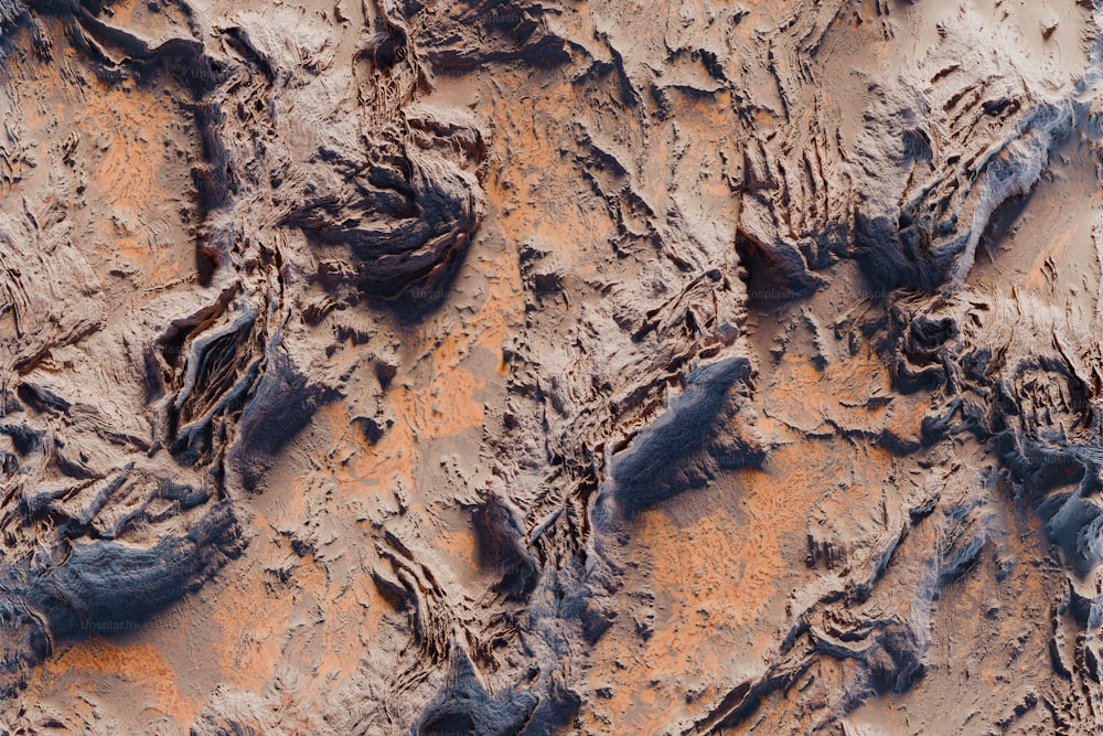 um close up de uma superfície de terra com rochas