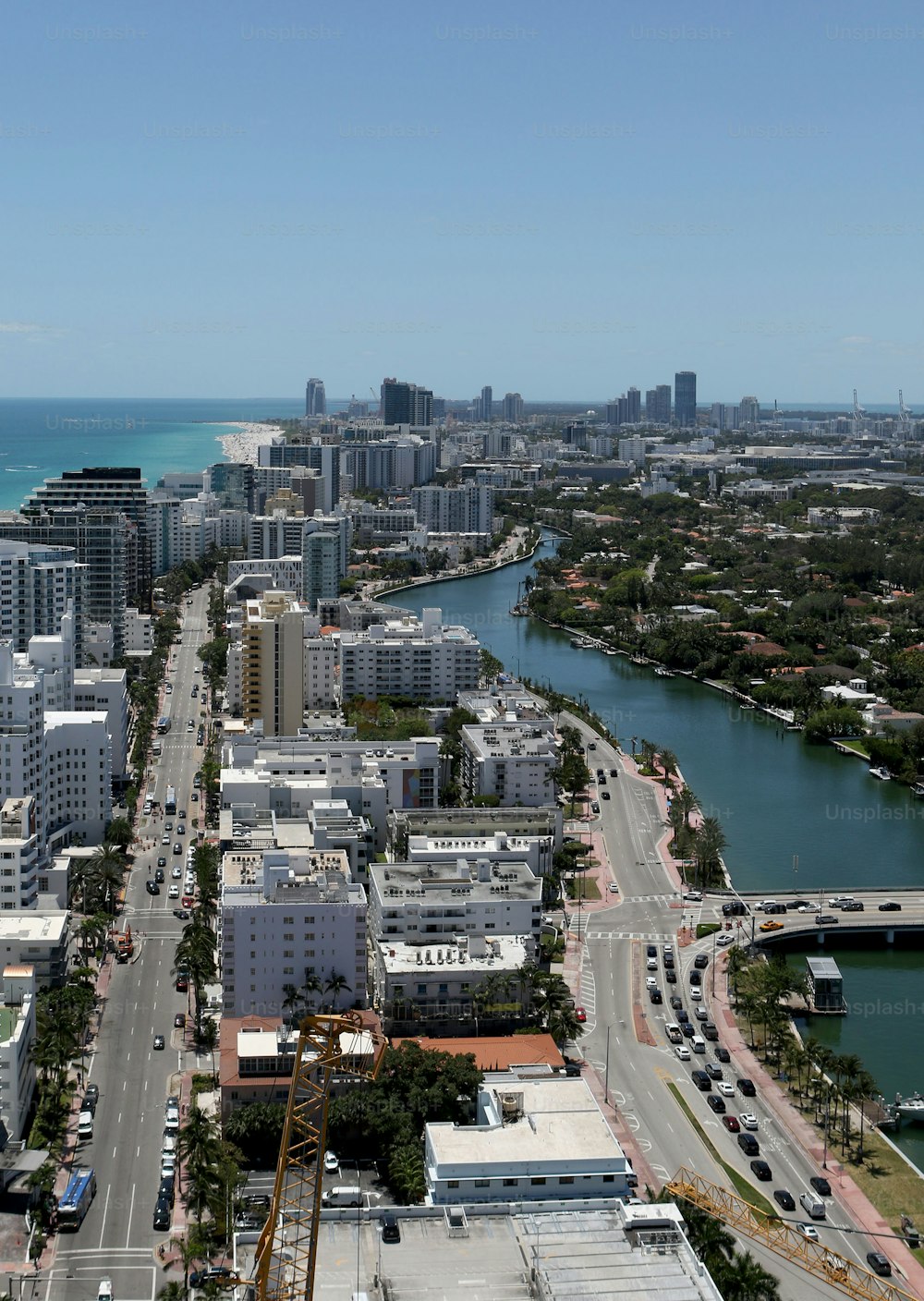 an aerial view of a city with a river running through it