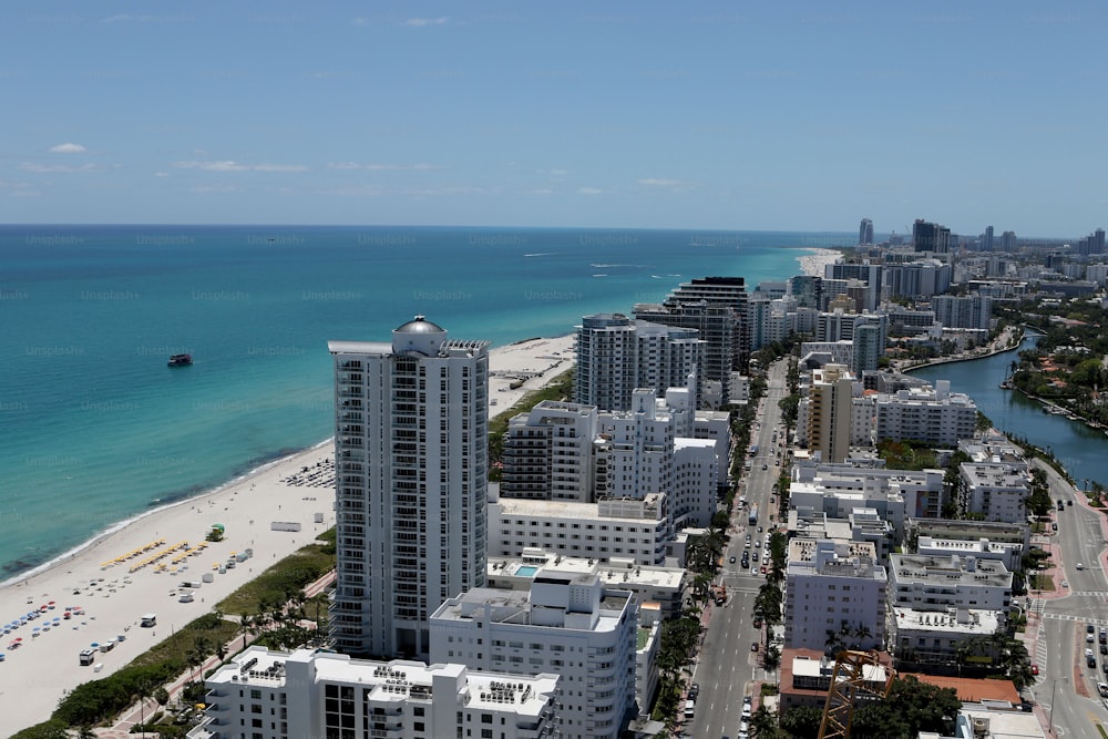 an aerial view of a city by the ocean